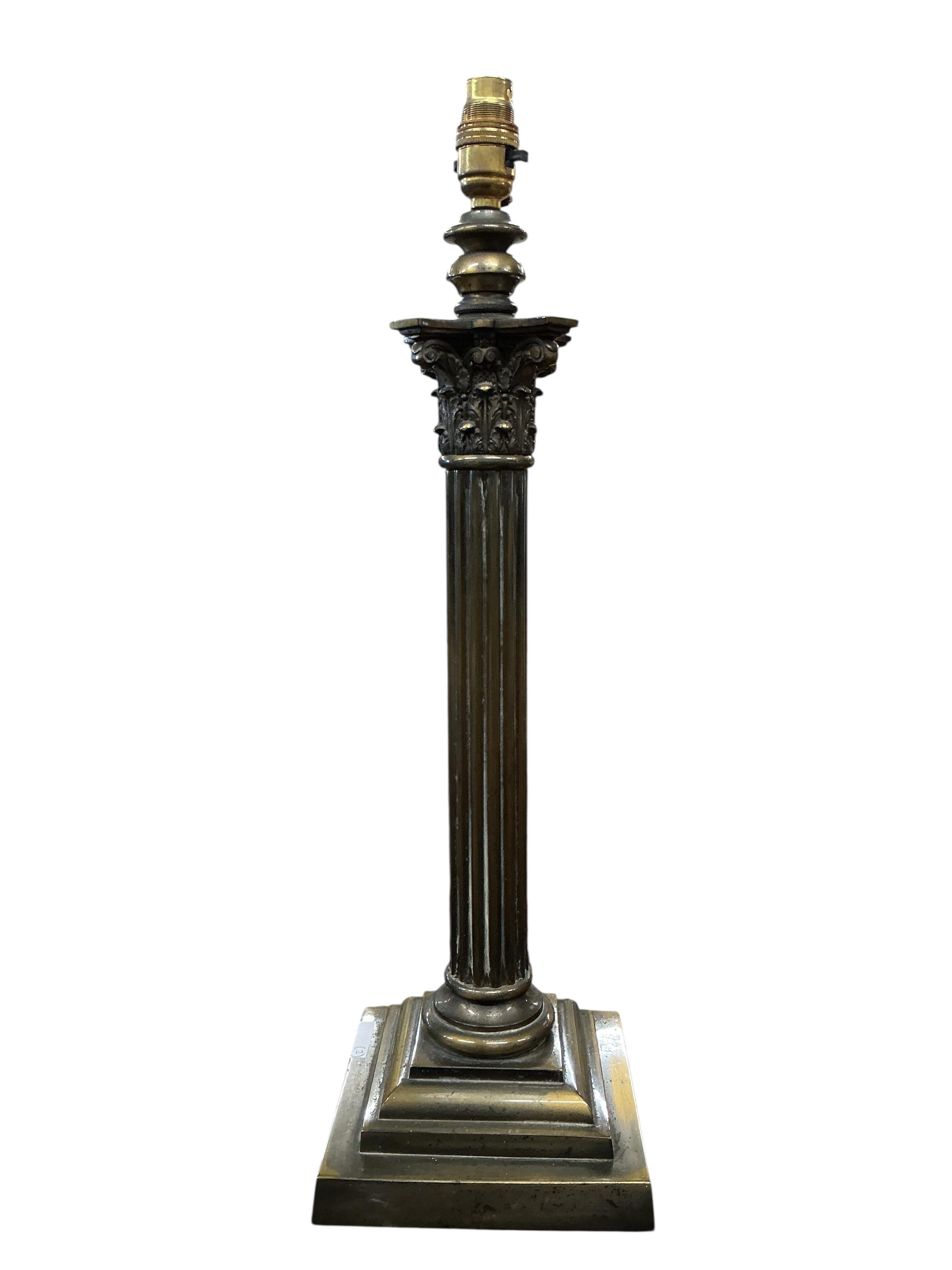 An early 20th century brass Corinthian column table lamp, height 56cm together with a larger Regency style table lamp